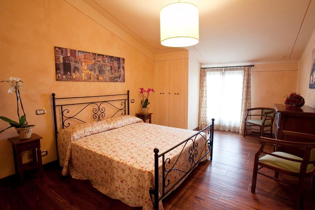 Aparthotel Residenza Palazzo Saloni Montalcino Zimmer foto