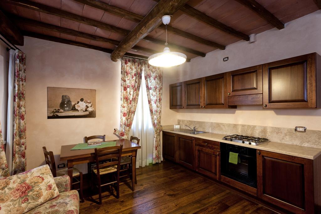 Aparthotel Residenza Palazzo Saloni Montalcino Exterior foto